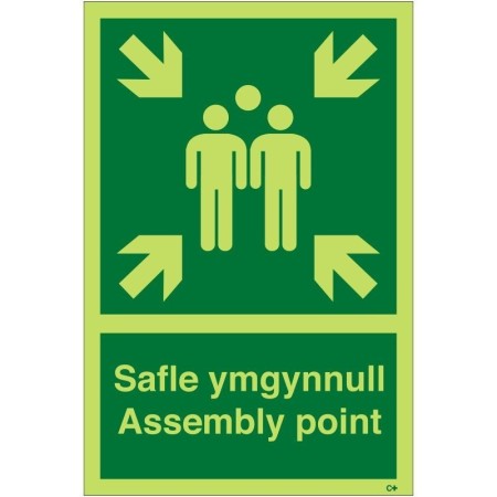Glow in the dark assembly point sign in Welsh and English