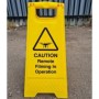 Caution remote filming in operation freestanding warning sign