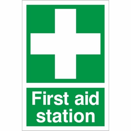 Green and white First Aid Station Sign with first aid cross