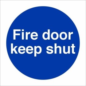 Fire Door Keep Shut mandatory sign with white text on a blue circular background
