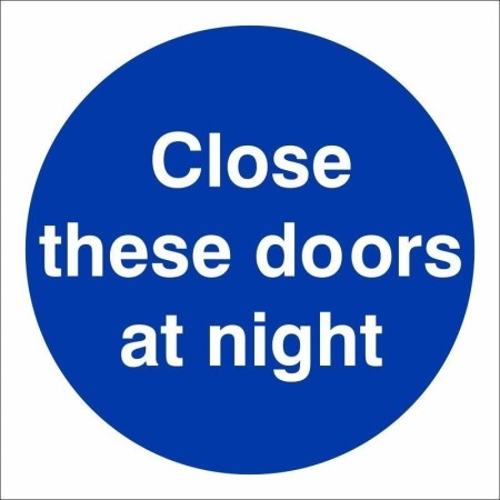 Close These Doors At Night mandatory sign with white text on a blue circular background