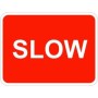 Slow traffic sign with bold white text on red background