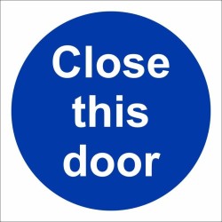Close This Door mandatory sign with white text on a blue circular background